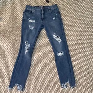 Express blue jeans with rips